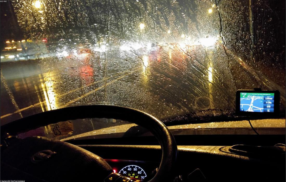 Night driving POV with GPS navigation